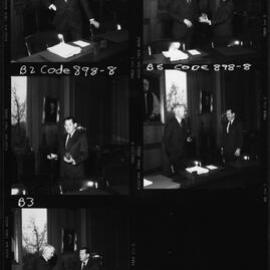 Pawsey, Maurice showing medal to J B. Potter