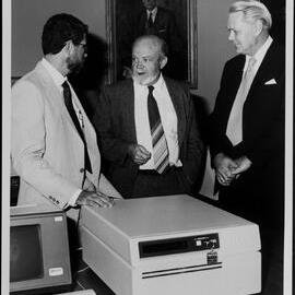 Poole, Professor Peter (centre) and Professor Whitton
