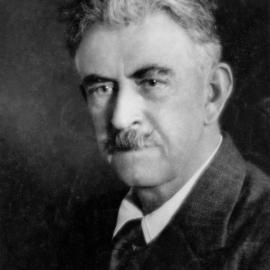 Studio portrait of Alfred Hill.