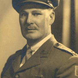 Studio portrait of Tom Inglis Moore.