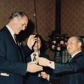 Prime Minister Malcolm Fraser receiving a birthday gift from the Prime Minister of Japan Zenko Suzuki in Japan in May 1982