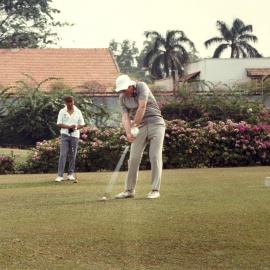 Malcolm Fraser playing golf in Kuala Lumpur during his visit to Malaysia in August 1982.