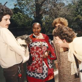 Wives of Commonwealth Heads of Government Meeting participants viewing a koala.