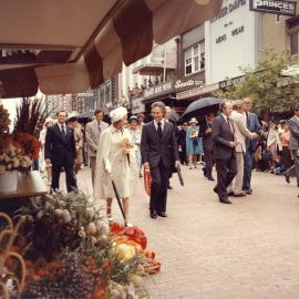 Queen Elizabeth II and the Premier of South Australia Don Dunstan walking in Rundle Mall, Adelaide, during her 1977 official visit to Australia.