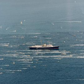 Aerial view of the Royal Yacht Britannia in Australian waters during the Queen's 1977 official Australian visit.