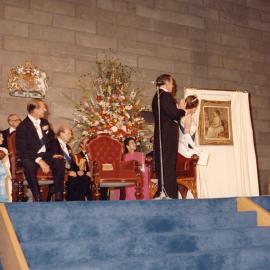 Queen Elizabeth II unveiling a Renoir painting at the National Gallery of Victoria in Melbourne during her 1977 official Australian visit.