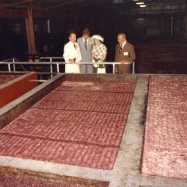 Queen Elizabeth II inspecting vats of wine at Kaiser Stuhl Wineries at Nuriootpa, South Australia, during her 1977 official visit to Australia.