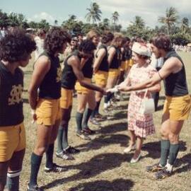 Queen Elizabeth II meeting members of the Saint Marys Football Club in Darwin during her 1977 official visit to Australia.