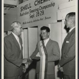 Photographs of sheep shearing championship and Blowfly chemical display at Royal Melbourne Show 1956 [2 of many]