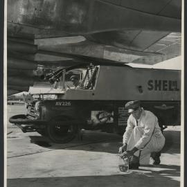 Photographs of aeroplanes, refueling services, flying boats and the flying padre [2 of many]