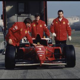 Photographs of motor sports events, vehicles and drivers [9 of many]