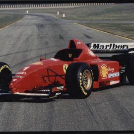 Photographs of motor sports events, vehicles and drivers [10 of many]