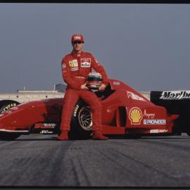 Photographs of motor sports events, vehicles and drivers [12 of many]