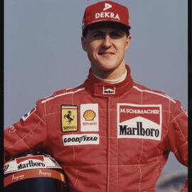 Photographs of motor sports events, vehicles and drivers [13 of many]