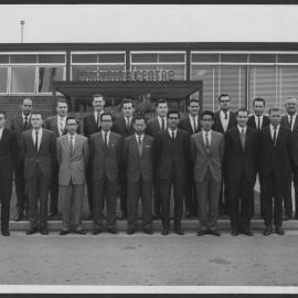 Photographs of workers at their jobs, special events, and training courses [4 of many]