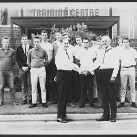 Photographs of workers at their jobs, special events, and training courses [5 of many]