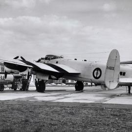 A Leyland Hippo Shell tanker alongside a British Avro Lancaster Type 683 bomber