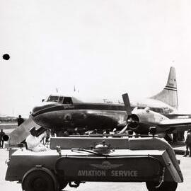 Shell Aviation Service equipment in front of Trans Australia Airlines U.S. made Convair CV-240-5 aircraft