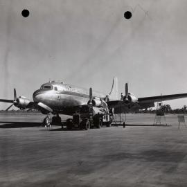 Douglas DC-4 Skymaster being refuelled from a Shell Aviation Service British Albion tanker truck