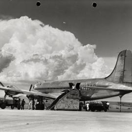 Douglas DC-4 Skymaster aircraft, undergoing refuelling at Parafield Airport, Adelaide, South Australia