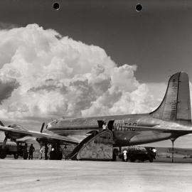 Refuelling a Douglas DC-4 Skymaster at Parafield Aerodrome, Adelaide, South Australia