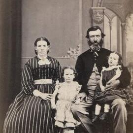 Studio portrait of an unidentified family group.
