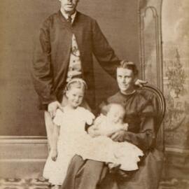 Studio portrait of an unidentified family group.
