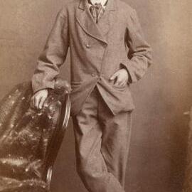 Studio portrait of an unidentified, well dressed  young man.