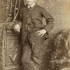 Studio portrait of an unidentified, well dressed young man.