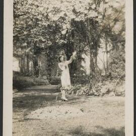 Christian Waller in garden under trees