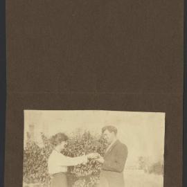 Christian and Napier Waller in front of fruit tree