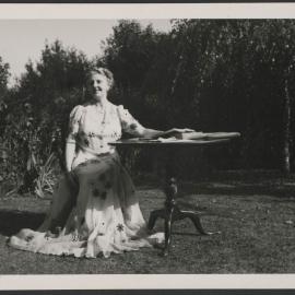 Louise Dyer in a garden
