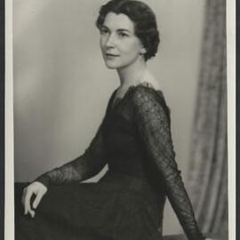 Studio portrait of Welsh contralto Helen Watts wearing a black lace gown