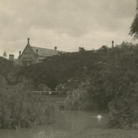 North-eastern corner of Main building with lake in foreground, University of Melbourne, circa 1936.