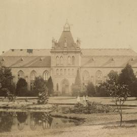 The National Museum with lake in foreground, University of Melbourne, circa 1862-1899.