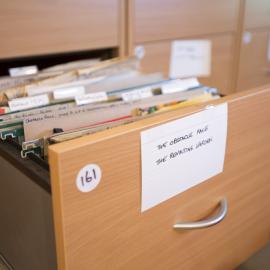[Filing cabinet drawer The Obstacle Race, The Revolting Garden, Office]