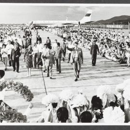 [Malcolm and Tamie Fraser and others at an airport in China]