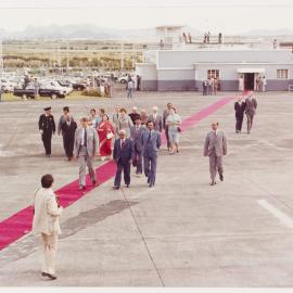 [Malcolm and Tamie Fraser and others at an airport]