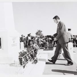 [Malcolm Fraser laying a wreath at a war memorial on a visit to the Northern Territory]