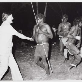 [Unidentified men, including Aboriginal Australians, at a ceremony during a visit to the Northern Territory]