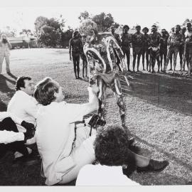 [Malcolm Fraser shaking hands with an unidentified Aboriginal Australian man in traditional dress, during a visit to the Northern Territory]