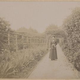 [Woman in the garden at Montalto, Orrong Road, Toorak]