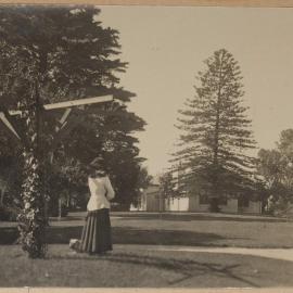 [Woman in garden at Miegunyah]