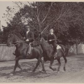 [Man and young boy riding horses, Harleston]