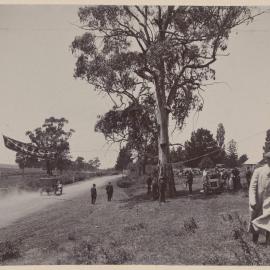 [Finish line of motor vehicle race]