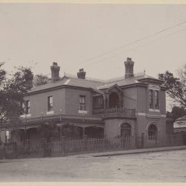 [Two storey house with chimneys]