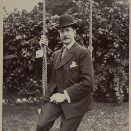 Harleston [man posing on swing]