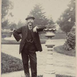 Avalon [man posing in garden]