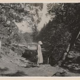 [Woman observing river]