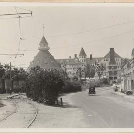 [View of motor car driving towards Coronado Beach Hotel]